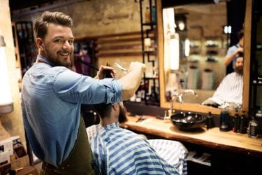 Kapper onderscheidt zich als barbier.